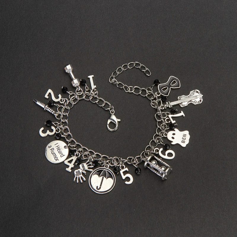 Women’s Vintage Silver Charm Bracelet Design - Image 6
